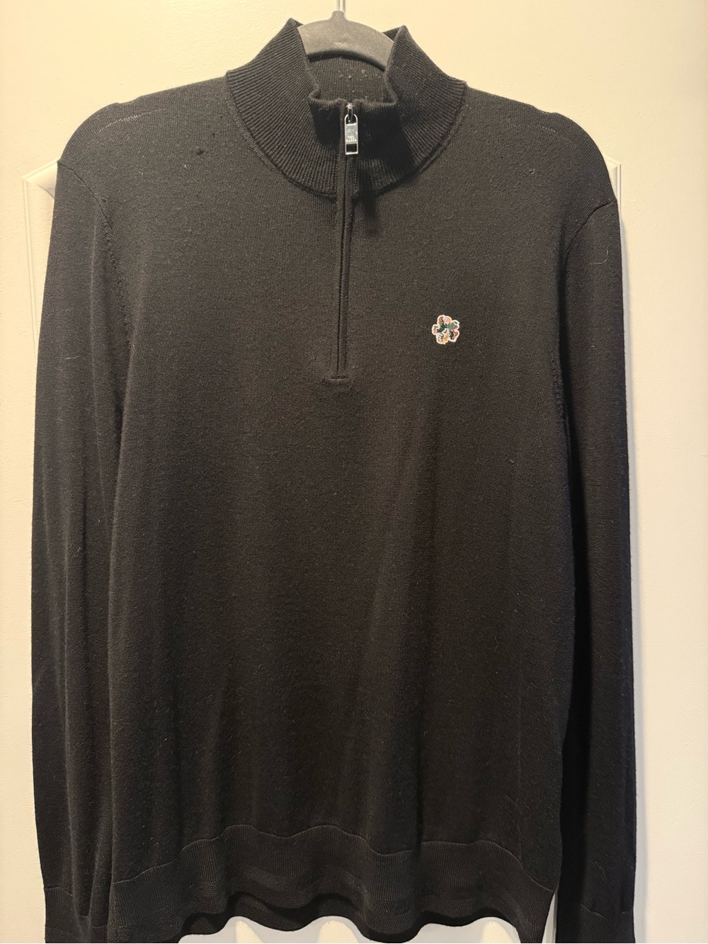 Ted Baker Men's Black Half-Zip Sweater with Subtle Floral Emblem